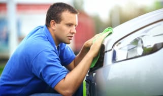 Man polishing Nissan Qashqai